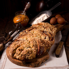 braided yeast bun with jam