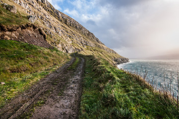 Fototapeta na wymiar On the gravel road, Faroes Islands