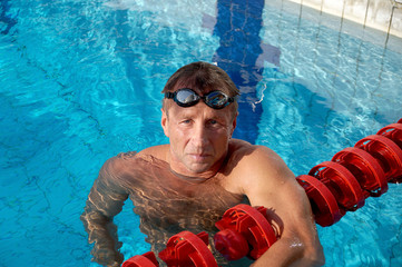 Swimmer in the swimming pool