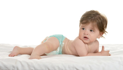 Baby girl lying in pampers