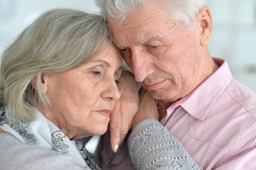 upset mature couple
