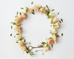 round frame of roses buds