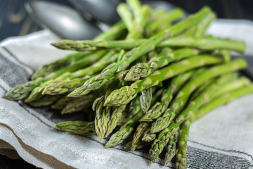 Spring season - fresh white and green uncooked asparagus
