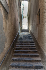 Fototapeta na wymiar Alley and steps in Portovenere in the Ligurian region of Italy