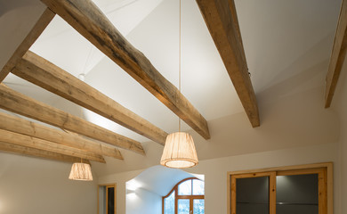 Obraz premium Wooden interior design. Wooden beams and floor to ceiling as a d