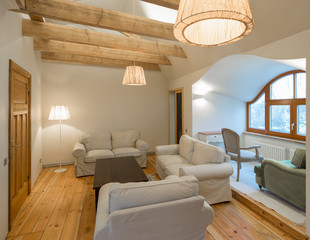 Wooden design. Apartment with wooden floors, ceilings and furnit