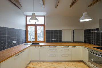 Kitchen interior in wooden style. Modern wooden interior design.