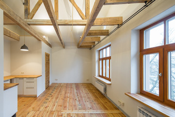 Wooden design. Room studio with a kitchen. Big wooden window.