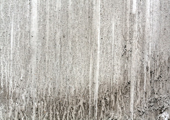 Dirty grey car surface.