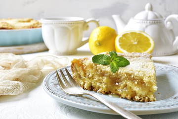 Piece of lemon pie for a breakfast.