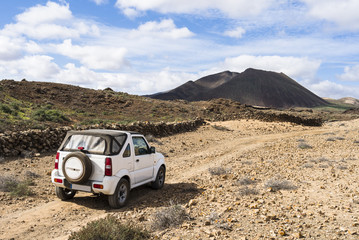 White off road vehicle in the outback of Fuerteventura Canary Is