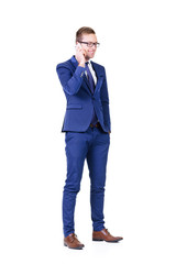 Young and confident business man. Businessman in suit isolated on white.