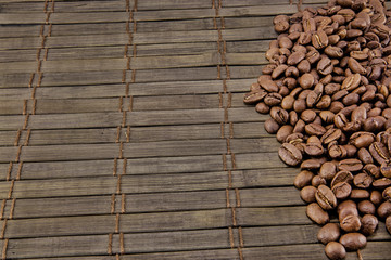 Coffee beans on vintage wooden board