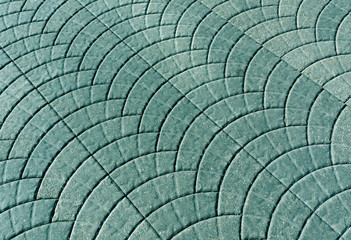 Cyan toned pavement surface.