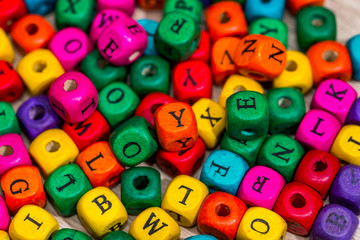 many colored wooden blocks for learning words. pre-school education.