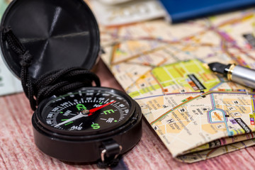 trip concept - map, compass, passport and euro money.