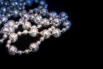 Pearl necklace isolated on dark background
