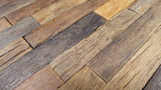 Old wooden plank rotate. Wood texture. Macro shot.