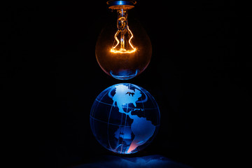 Light bulb and earth
