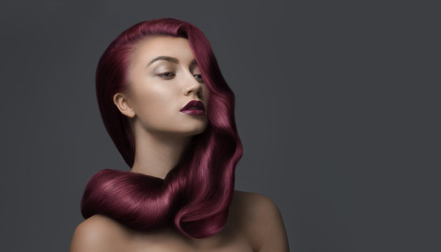 woman with beautiful dark pink hair