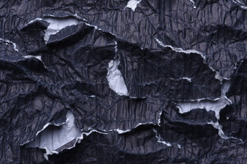 Wrinkled black paper