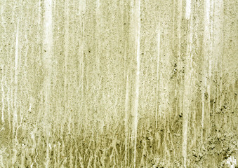 Dirty yellow car surface.