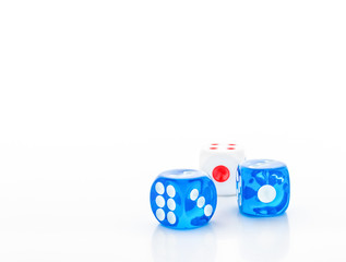 blue and white dices on light background