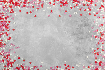 Pink, white and red hearts on a light background. Top view, copy