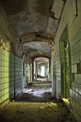 Fototapeta na wymiar Interiors of corridor of an abandoned mansion of Khvostov in gothic style 