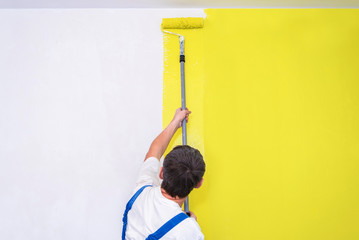 Painter use paint roller