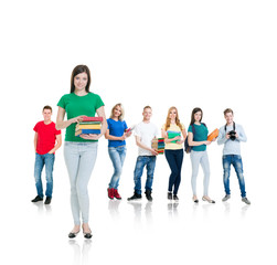 Obraz premium Large group of teenage students isolated on white background. Many different people standing together. School, education, college, university concept.