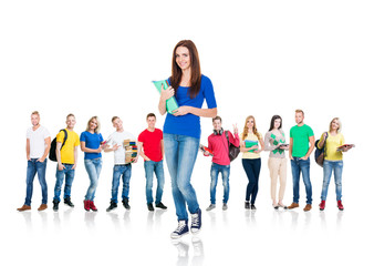 Obraz premium Large group of teenage students isolated on white background. Many different people standing together. School, education, college, university concept.