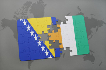 puzzle with the national flag of bosnia and herzegovina and cote divoire on a world map