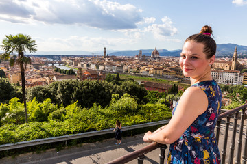 View of a girl at the Michelangelo Square in Florence in Italy