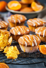 Carrot tangerine cupcakes with glaze and caramel topping