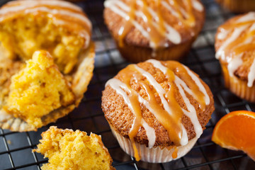 Carrot tangerine cupcakes with glaze and caramel topping