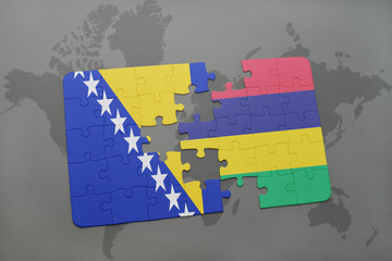 puzzle with the national flag of bosnia and herzegovina and mauritius on a world map