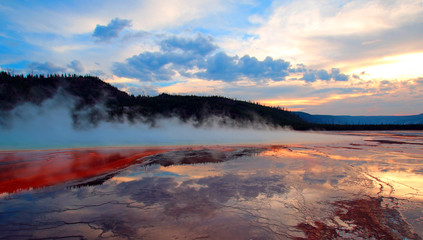 Grand Prismatic Spring under sunset clouds in Yellowstone National Park in Wyoming USA