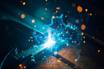 artistic welding sparks light, industrial background