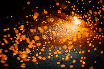 artistic welding sparks light, industrial background