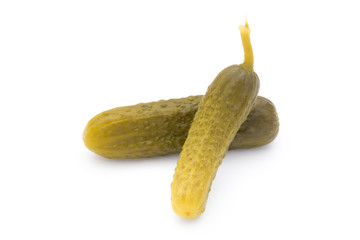 Marinated pickled cucumbers isolated on the white.