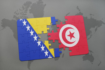 puzzle with the national flag of bosnia and herzegovina and tunisia on a world map