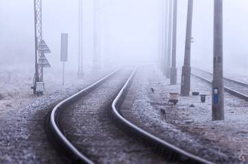 Railroad tracks, foggy winter morning. © Aneta