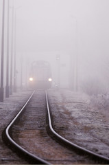 Railroad tracks, foggy winter morning. © Aneta