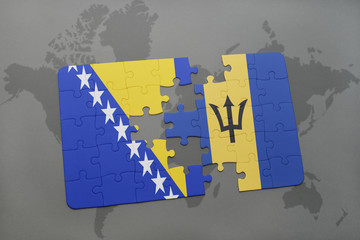 puzzle with the national flag of bosnia and herzegovina and barbados on a world map
