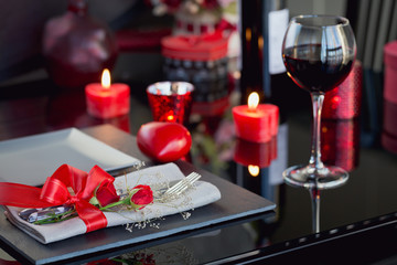Table place setting with holidays decoration.
