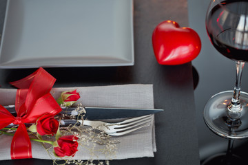 Table place setting with holidays decoration.