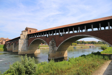 Fototapeta na wymiar ancient bridge over the TICINO River in Pavia
