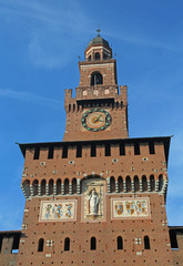 Fototapeta na wymiar big clock tower of Castle called Castello Sforzesco in Italy