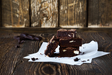 Chocolate brownies with cream cheese on baking paper